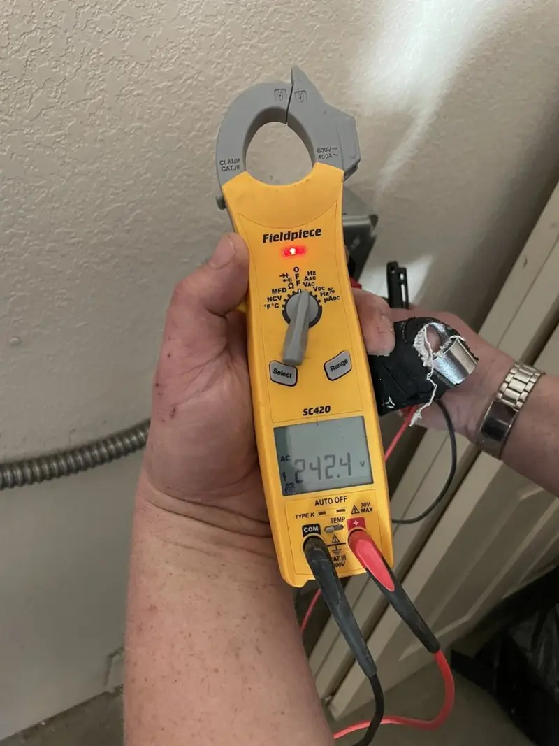 Voltage testing with clamp meter during Circuit Breaker Repair in Madisonville